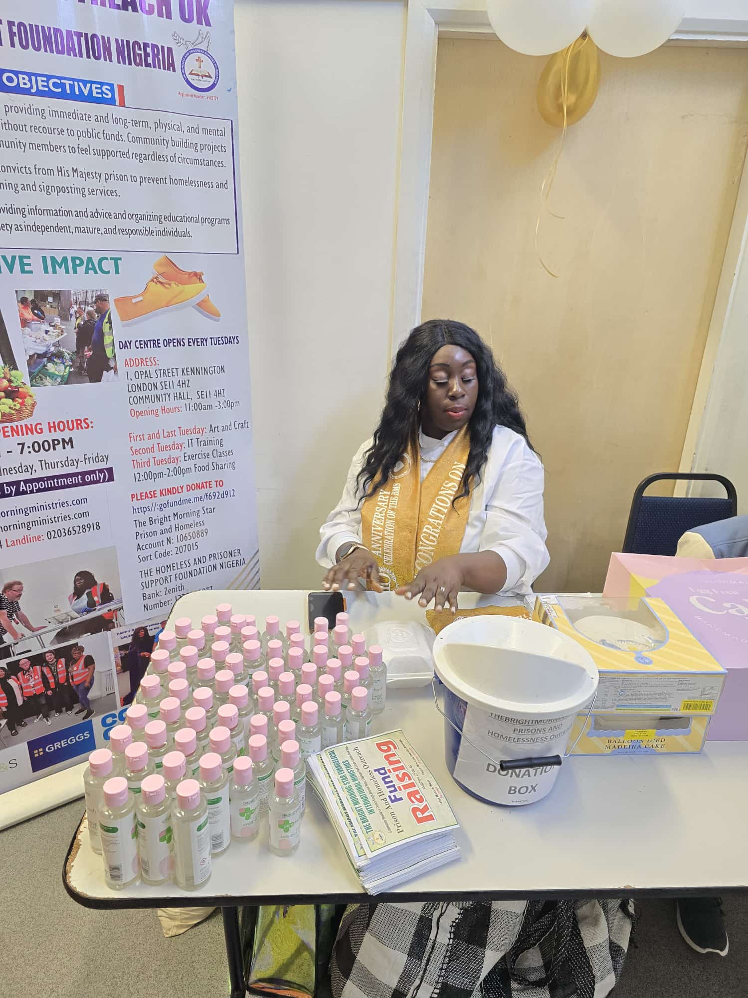 Outreach and support materials table at the celebration