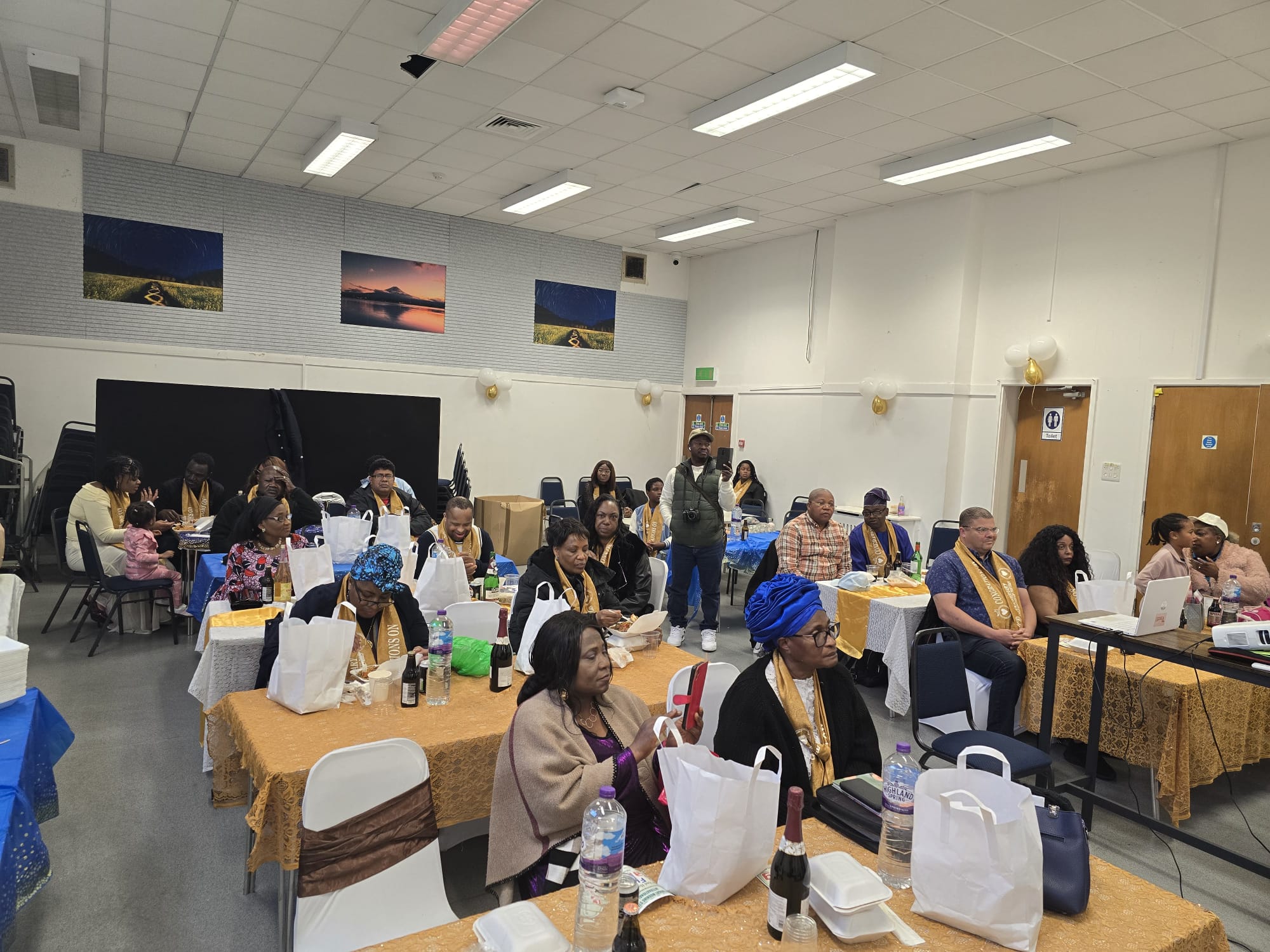 Full view of the anniversary celebration venue with attendees