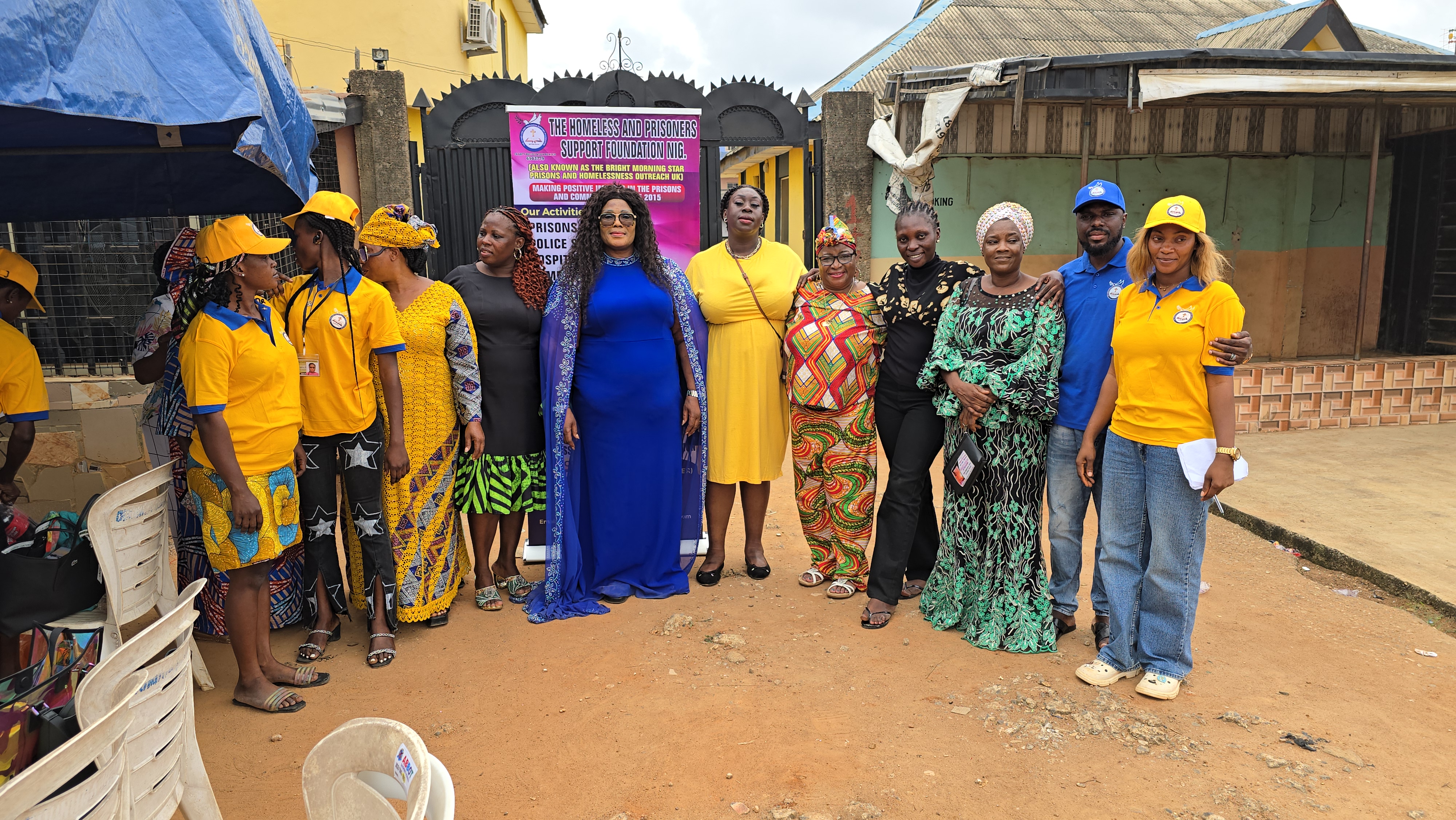 Mission team with local community leaders and volunteers in traditional attire