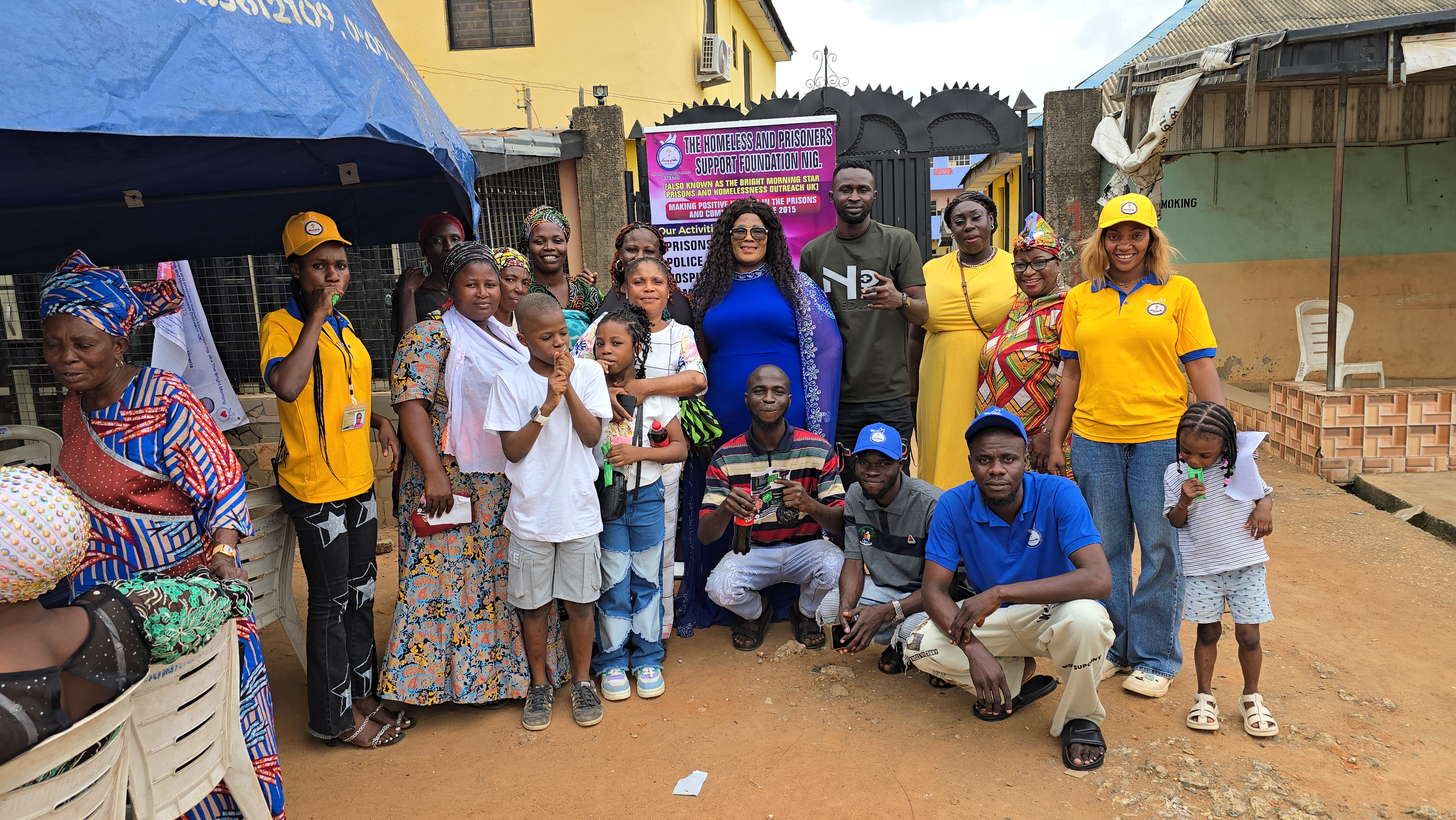 Mission team group photo with community members and children