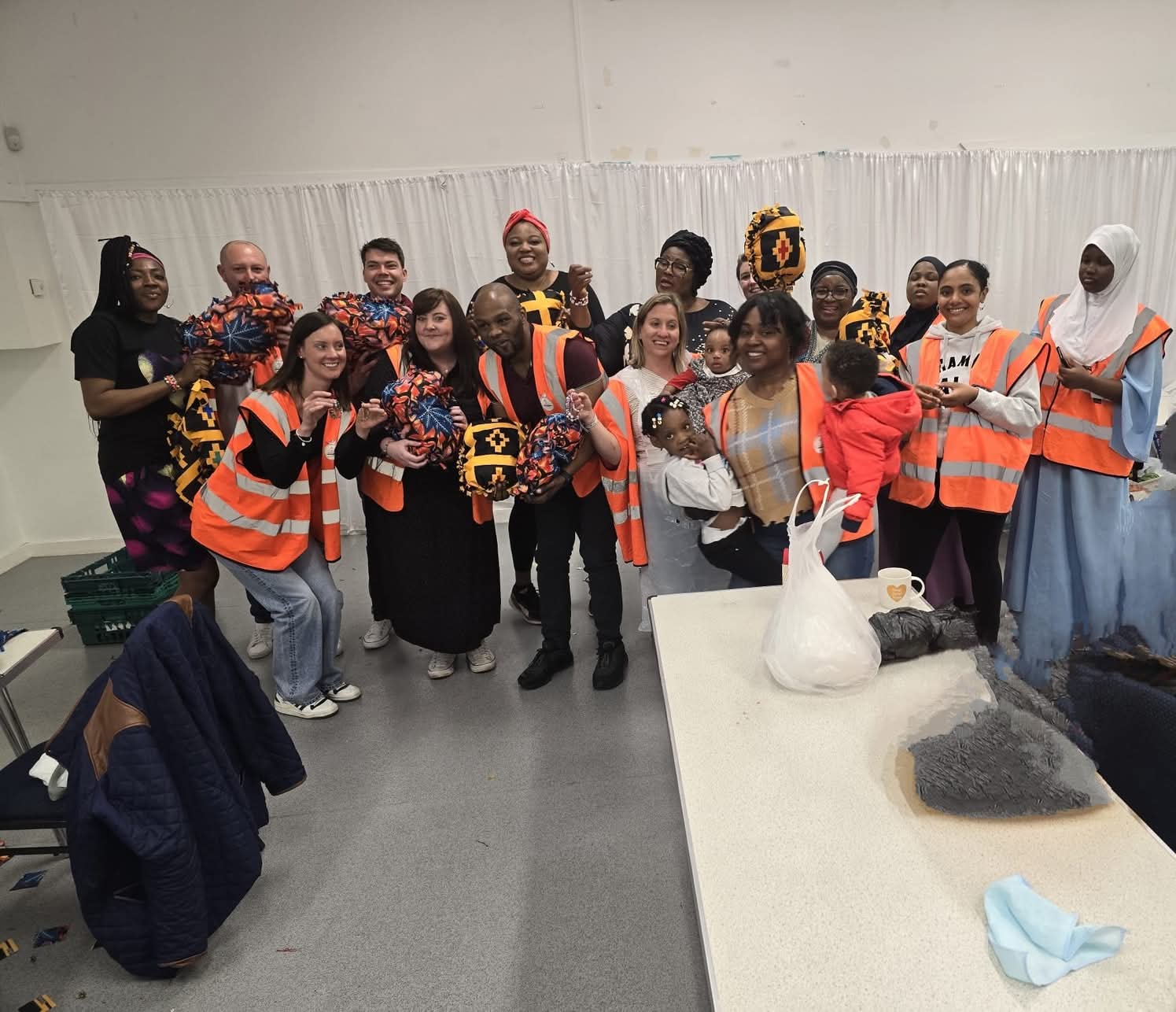 Volunteer team working together at community event